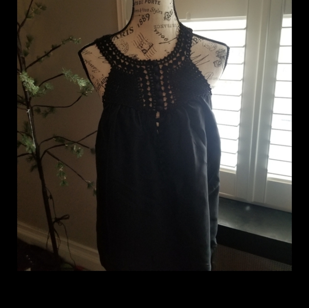 BCBG Maxazaria ladies black silk blouse new with tags.